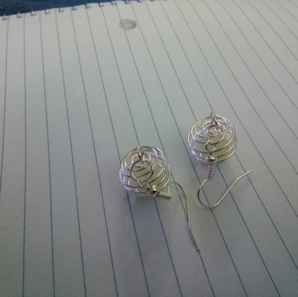 Silver colored spiral Cage earrings
